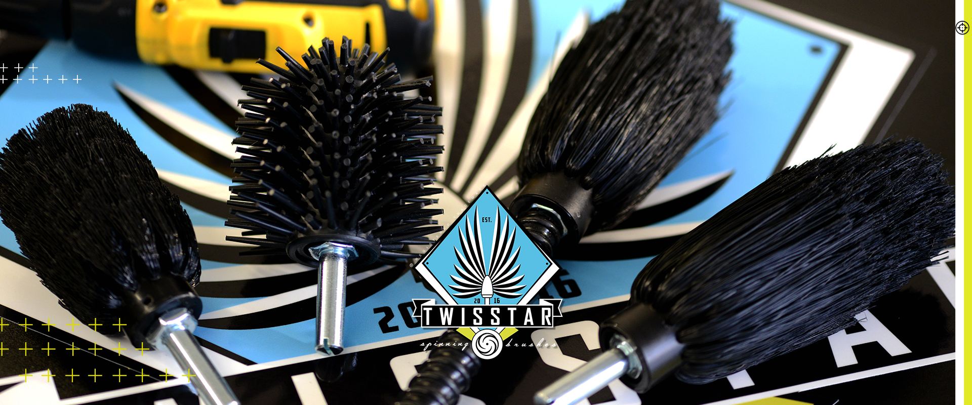 Four TwistStar drill brushes laid across the brand emblem, a cordless drill at the top edge.