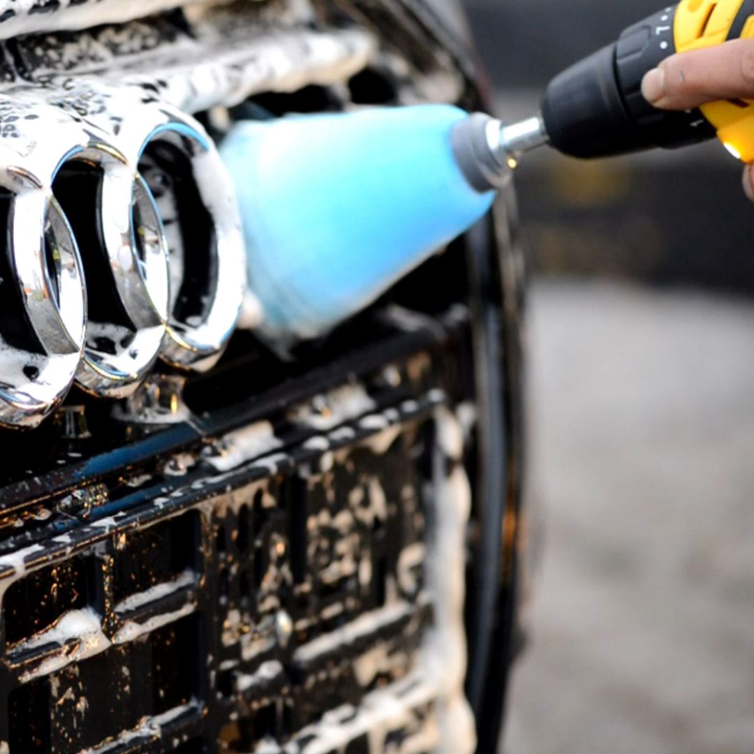 Brand photography — rim brush spinning inside a foamed alloy wheel.